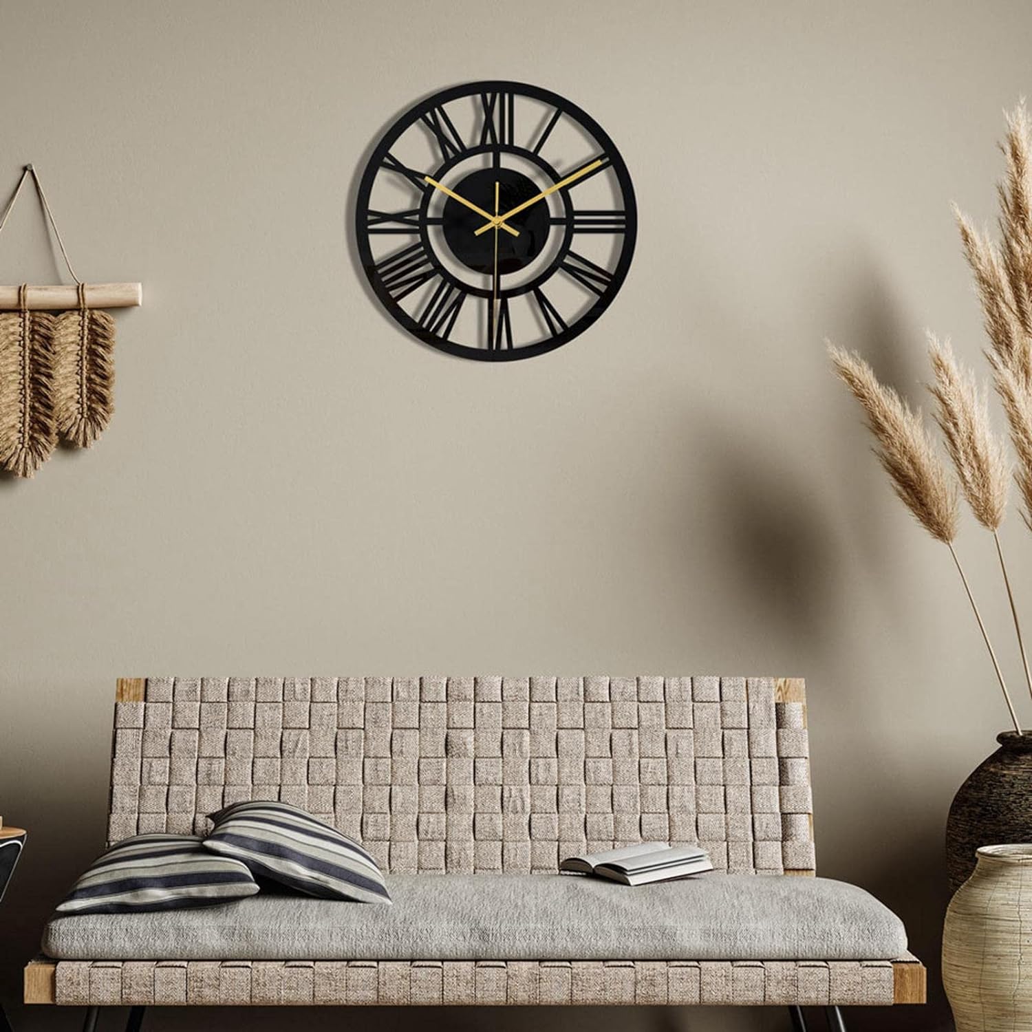Antique metal wall clock as part of elegant living room decor