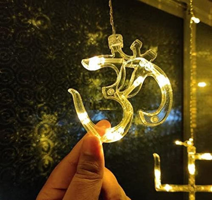 Close-up of Swastik Om symbols on DECAWALL LED string lights