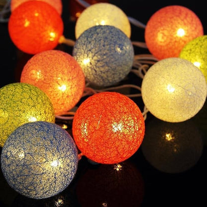 Cotton ball string lights hanging for a cozy bedroom ambiance
