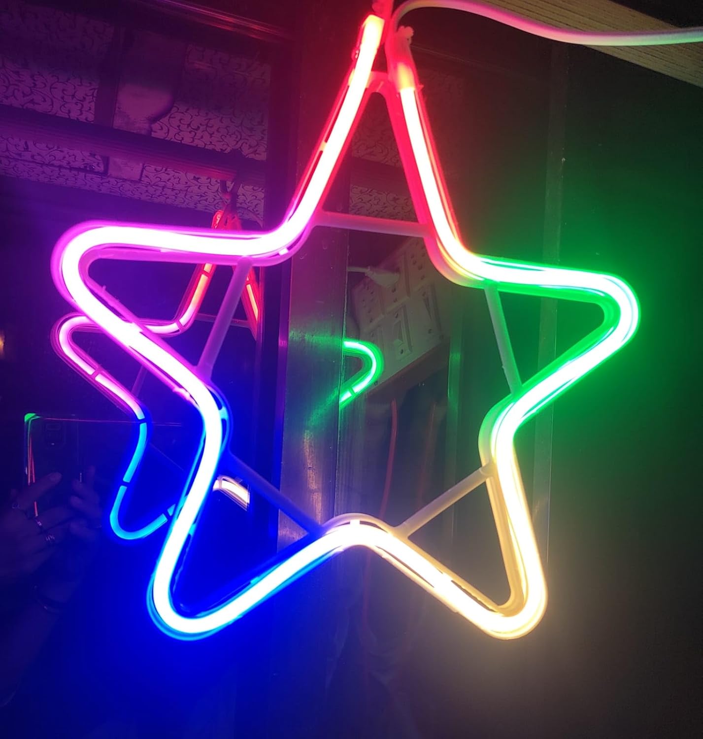 Double-sided neon star light glowing with vibrant colors