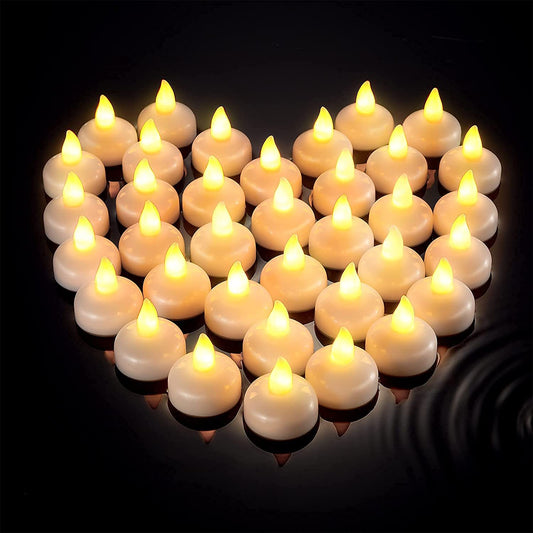 Floating tealight LED candles with water sensor for safe, flickering light decor