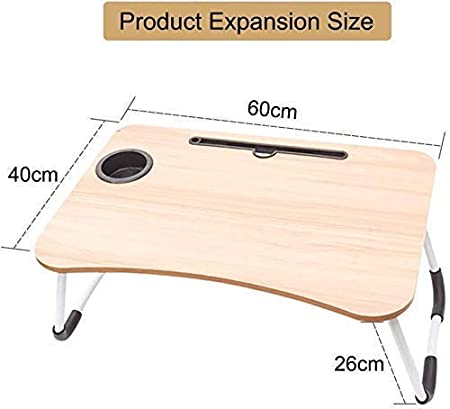 Foldable wooden laptop table used for studying with books and a laptop