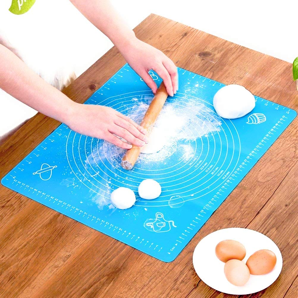 Person rolling chapati on a Decawall non-stick silicone mat in the kitchen