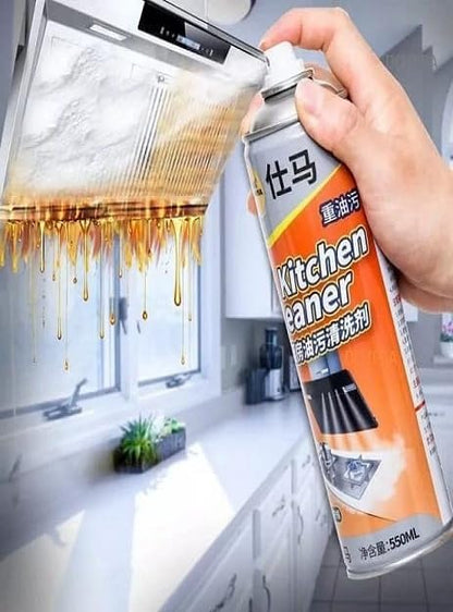 Removing grease and stains from a gas stove using kitchen cleaner spray