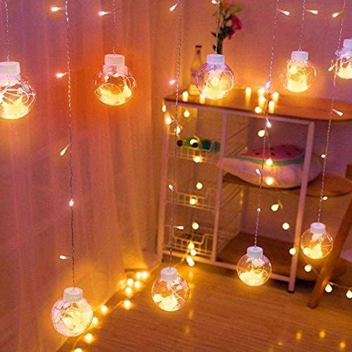 Warm white and golden ball lights used for indoor party 
